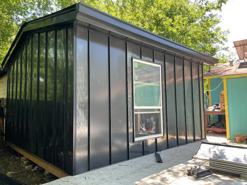 Black standing seam metal wall panels for Roof Inspection in Upper Dublin